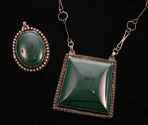 Appraisal: Two Sterling Silver and Malachite Pendants Two large malachite pendants