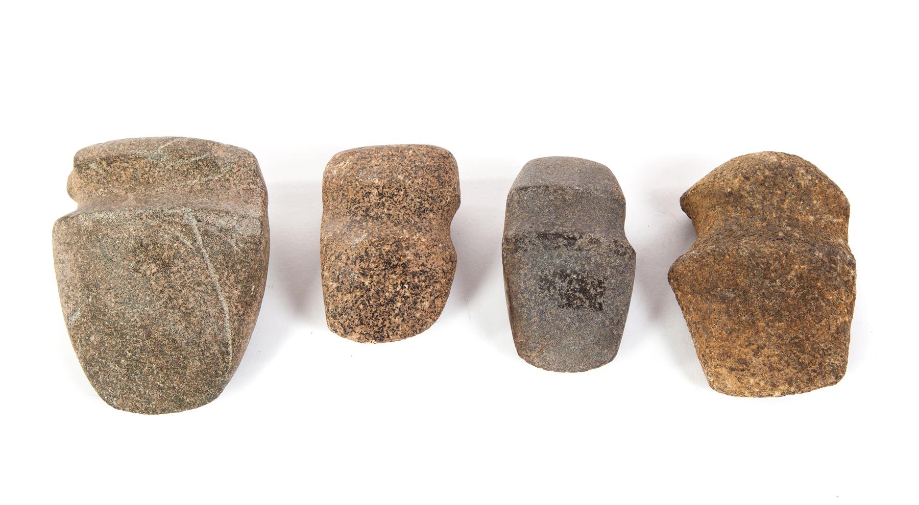 Appraisal: FOUR NATIVE AMERICAN STONE GROOVED AXES Largest l