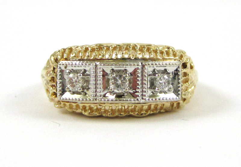 Appraisal: DIAMOND AND FOURTEEN KARAT GOLD RING The yellow and white