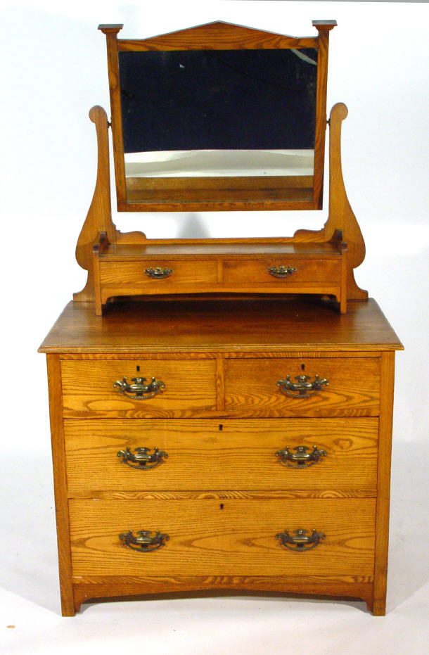 Appraisal: Oak Art Nouveau mirrored back chest fitted two short drawers