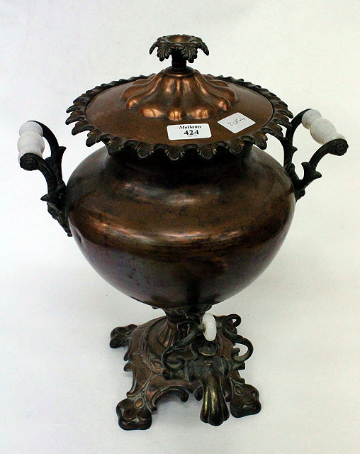 Appraisal: AN ART NOUVEAU COPPER SAMOVAR with glass handles and shaped