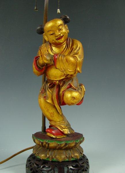 Appraisal: CHINESE DANCING IMMORTAL LACQUERED WOOD FIGURE MOUNTED AS A LAMP