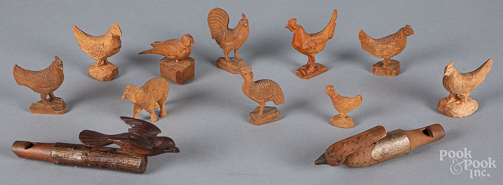 Appraisal: Group of carved animals bird whistles etc Group of carved