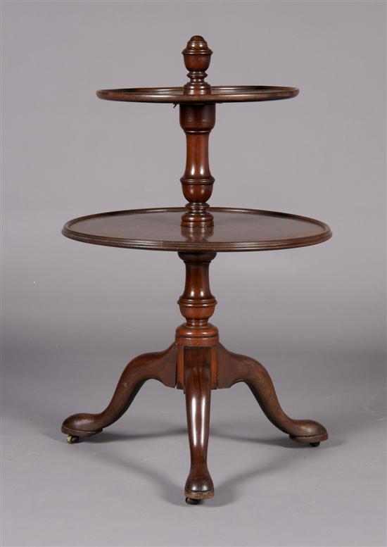 Appraisal: An English Mahogany Two-Tiered Dumb Waiter Height inches