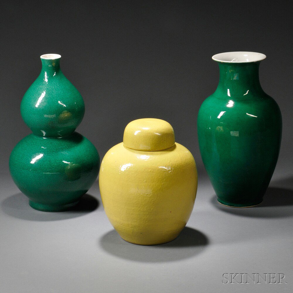 Appraisal: Three Ceramic Pieces China two fine-crackle green monochrome vases and