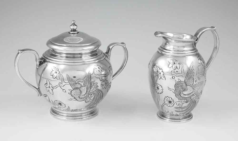 Appraisal: PIECE TIFFANY HAND CHASED STERLING CREAMER SUGAR Both with chased