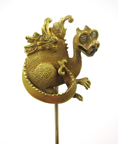 Appraisal: FOURTEEN KARAT YELLOW GOLD DRAGON STICK PIN set with two