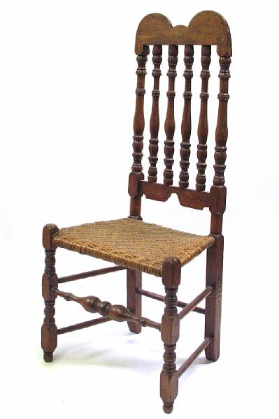 Appraisal: An American banister back side chair crest and two front