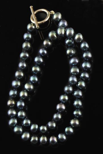 Appraisal: Single Strand of Black Freshwater Pearls measuring an average mm