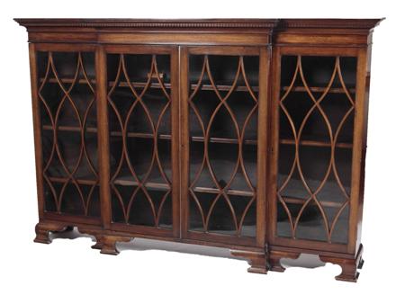 Appraisal: A George III style mahogany low breakfront bookcase the projected