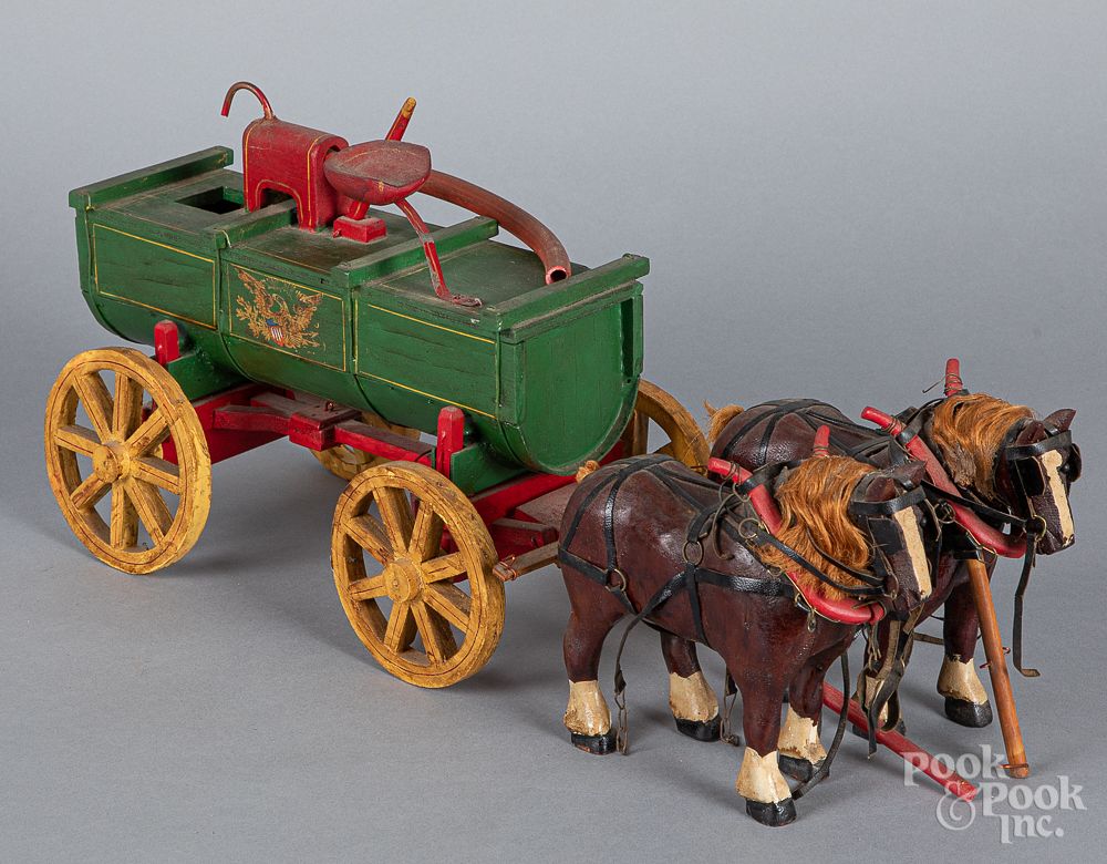 Appraisal: Painted wood horse drawn fire wagon th c Painted wood