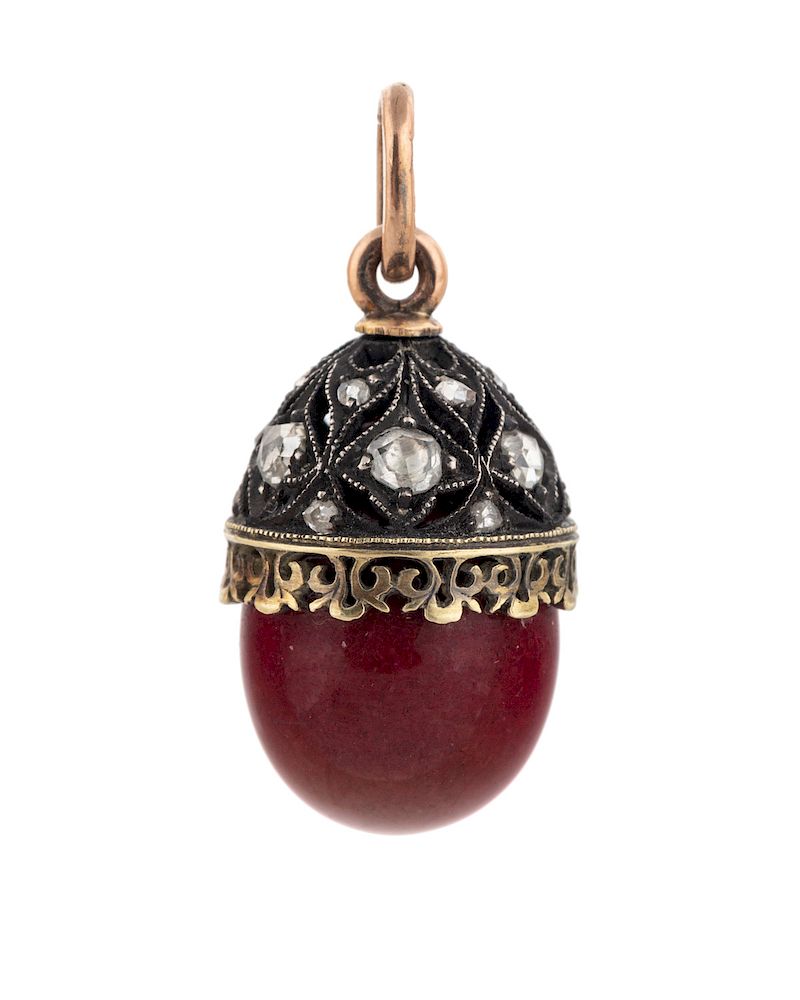 Appraisal: A FABERGE PURPURINE GOLD AND DIAMOND EGG PENDANT WORKMASTER HENRIK