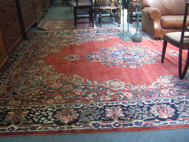 Appraisal: A Bakhtiari carpet the plain madder field with a floral