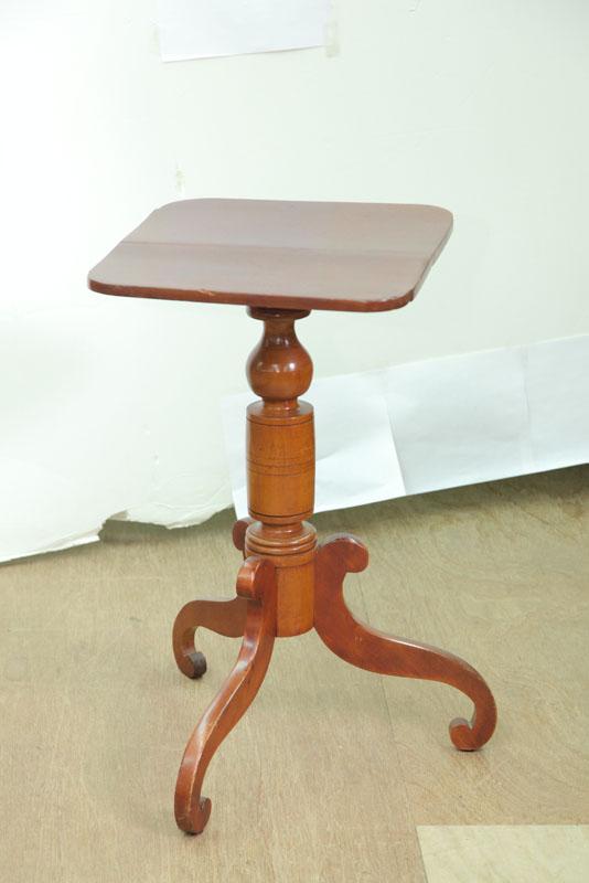 Appraisal: CANDLESTAND Cherry having a square top with rounded corners turned