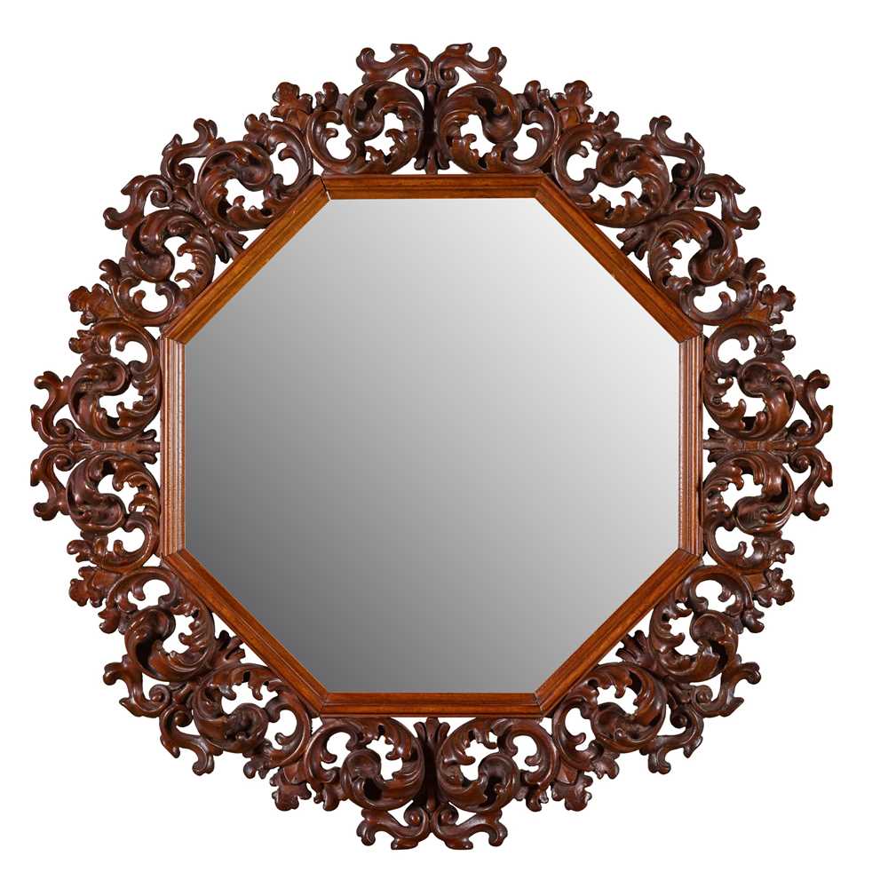 Appraisal: BAROQUE STYLE CARVED WALNUT MIRROR TH CENTURY the octagonal mirror