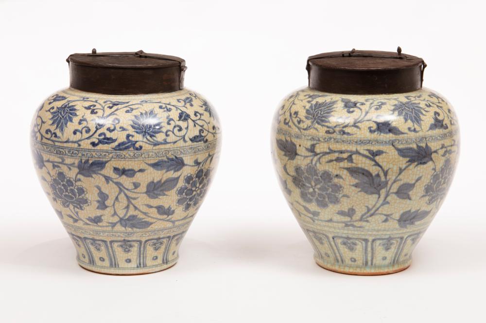 Appraisal: Pair of Chinese Iron-Mounted Blue and White Porcelain Tea Storage