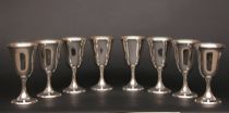 Appraisal: A Set of Eight Silver Goblets Each tapering form raised