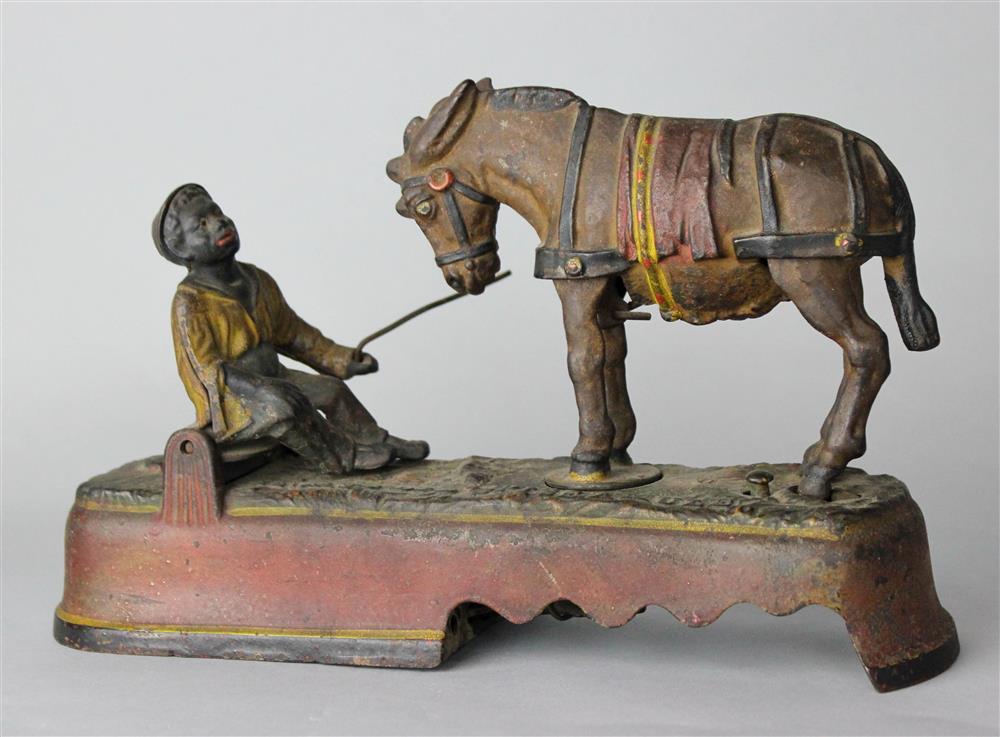 Appraisal: I ALWAYS DID SPISE A MULE MECHANICAL BANK manufactured by