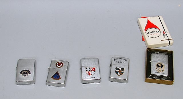 Appraisal: Grouping of five lighters including Zippo Armish-Maag Tehran Iran boxed