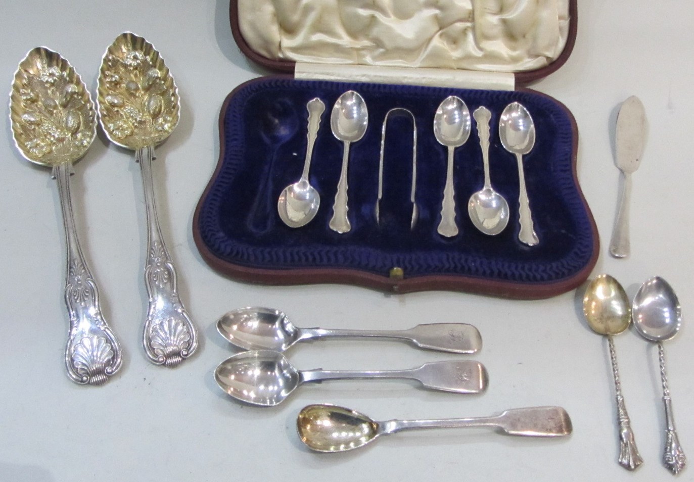 Appraisal: Five silver coffee spoons and a matching pair of sugar