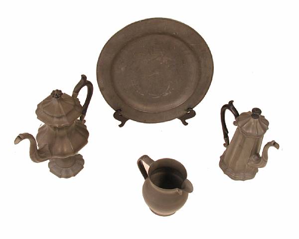 Appraisal: A group of American pewter comprising a covered coffee pot