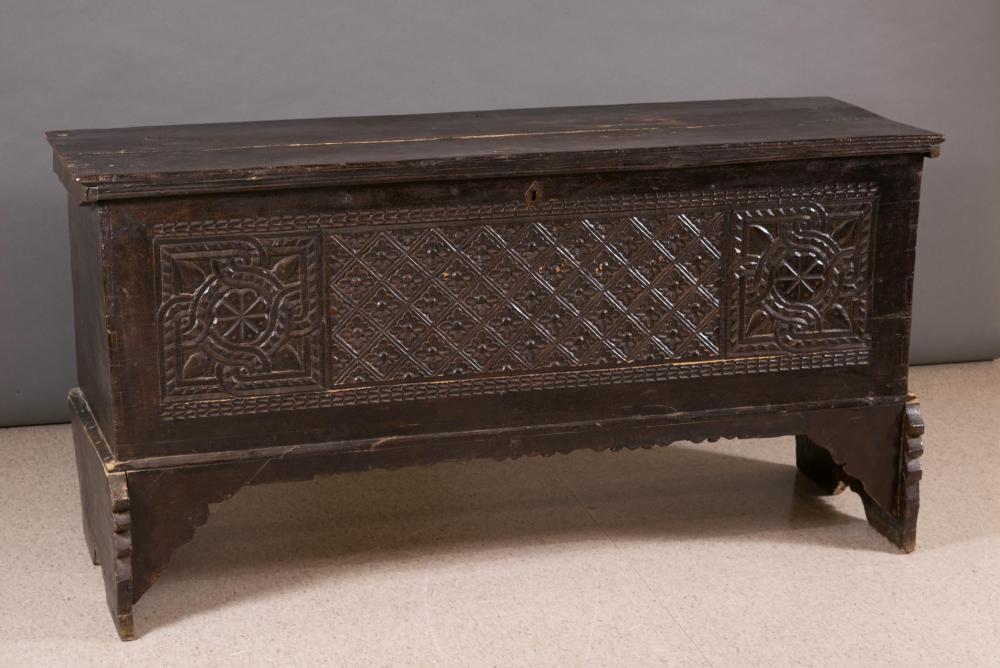 Appraisal: LIFT-TOP CARVED PINE COFFER Continental th century elements H x