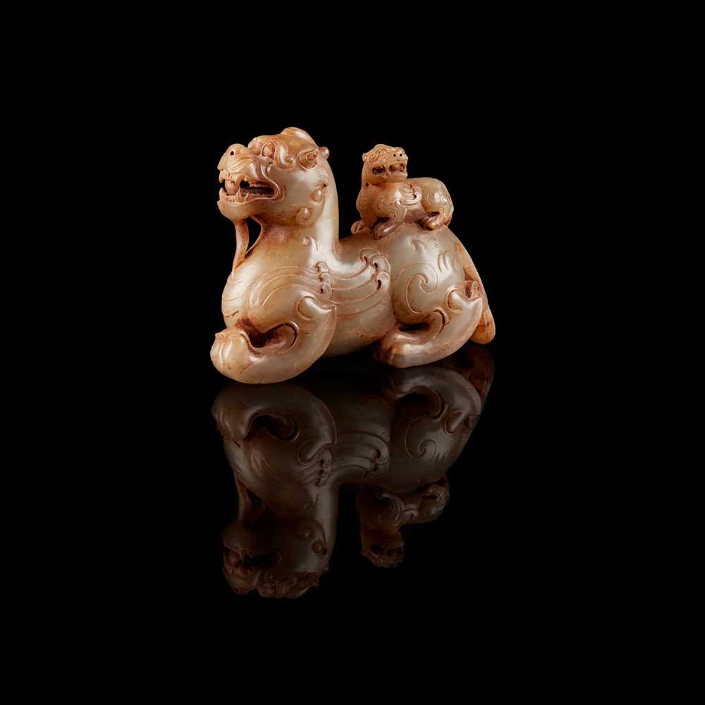 Appraisal: CELADON JADE CARVING OF MYTHICAL BEAST AND CUB of Han