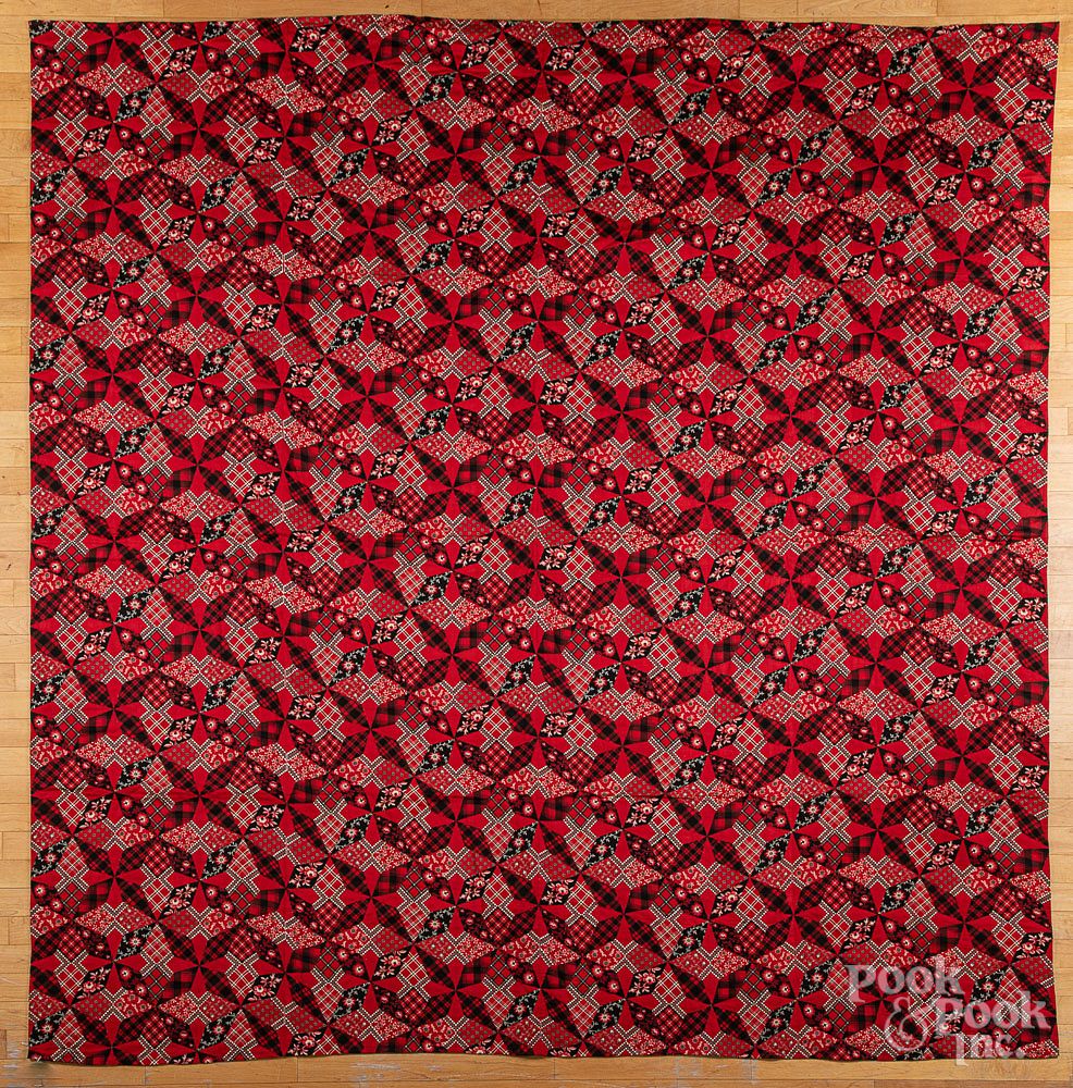 Appraisal: Pennsylvania pieced red and black quilt Pennsylvania pieced red and