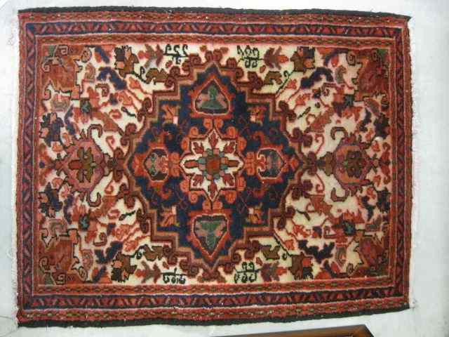 Appraisal: Heriz Persian Handmade Mat geometric designs red on ivory '