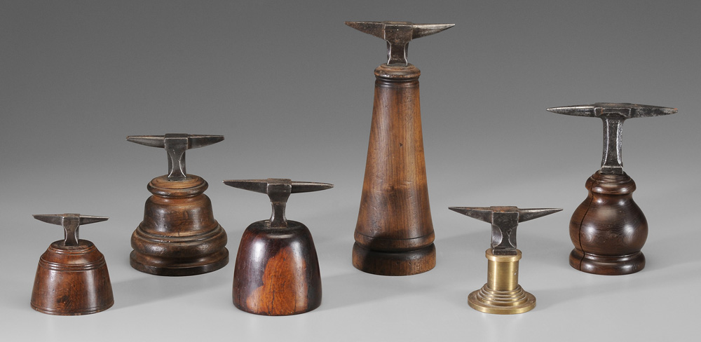 Appraisal: Six Jeweler Anvils all with wooden bas