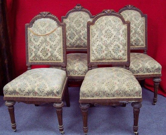 Appraisal: Four th Century oak framed salon chairs the arched upholstered