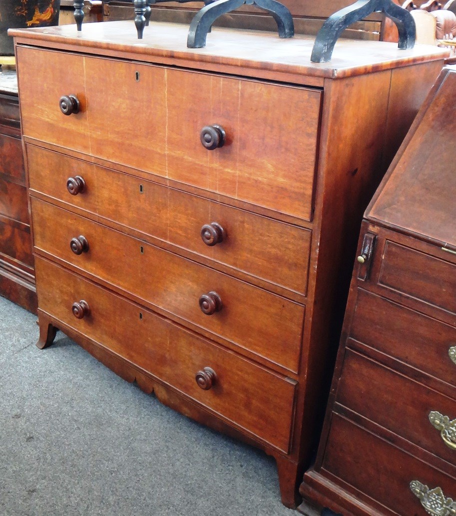 Appraisal: A George III mahogany banded oak secretaire chest the fitted