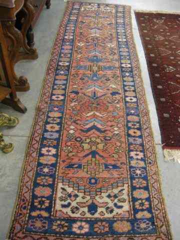 Appraisal: Heriz Persian Handmade Runner primary reds blues tan stylized floral