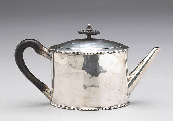 Appraisal: A George III silver and wood teapotJoseph Bradley London Of