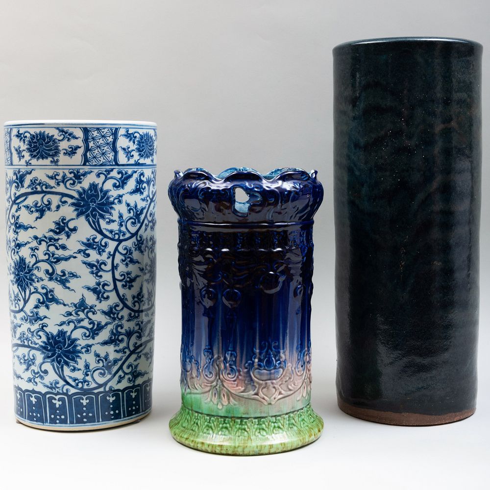 Appraisal: Group of Three Cylindrical Umbrella Stands Comprising A dark green