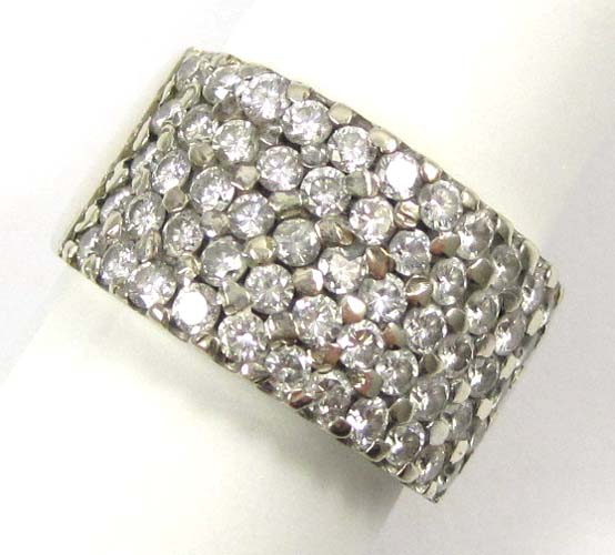 Appraisal: DIAMOND AND FOURTEEN KARAT WHITE GOLD RING set with round-cut