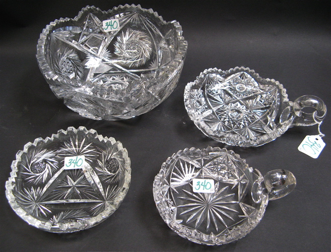 Appraisal: FOUR PIECES AMERICAN CLEAR CUT CRYSTAL TABLEWARE star and fan