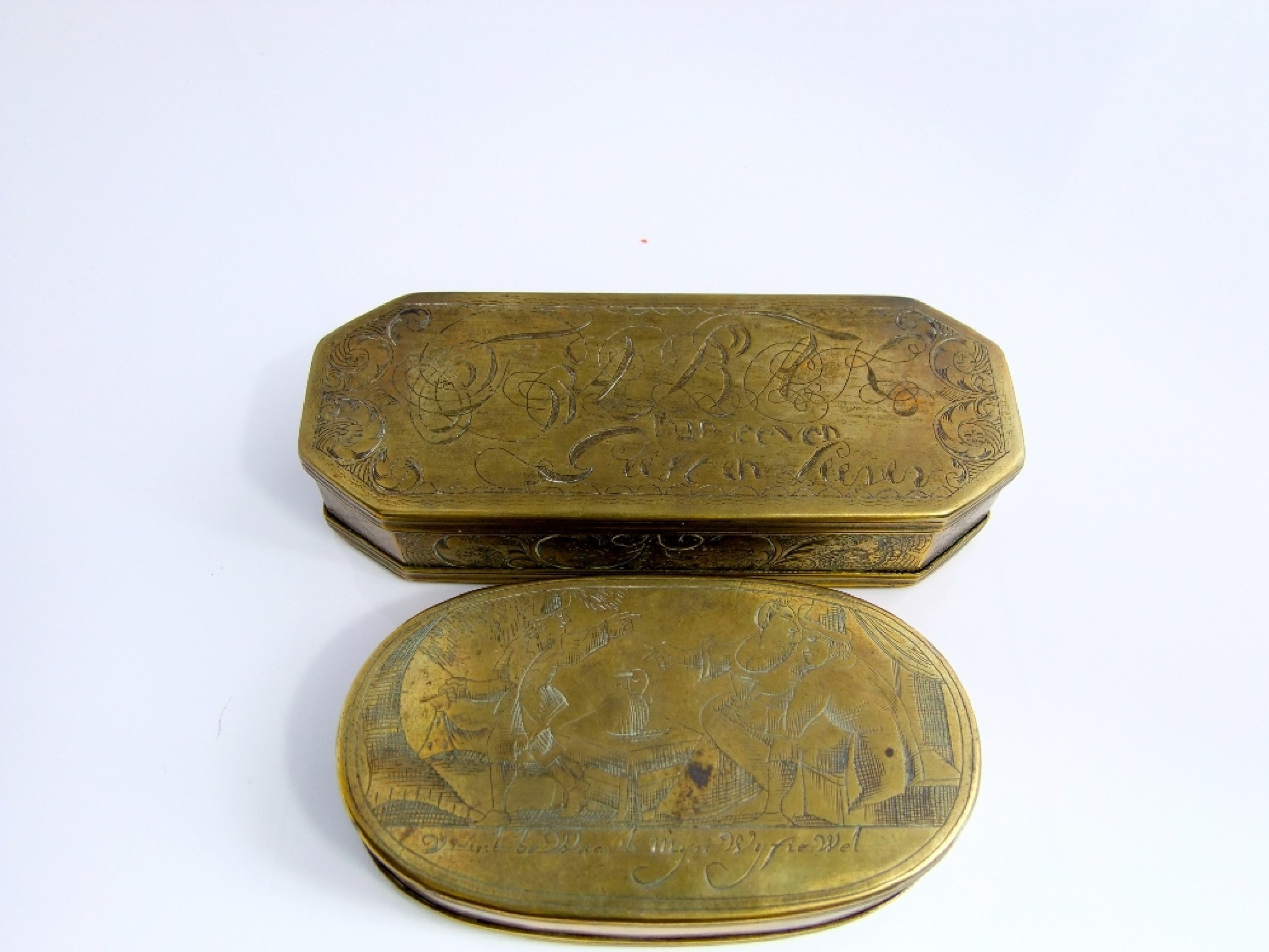 Appraisal: Two th century Dutch brass tobacco boxes one of oval