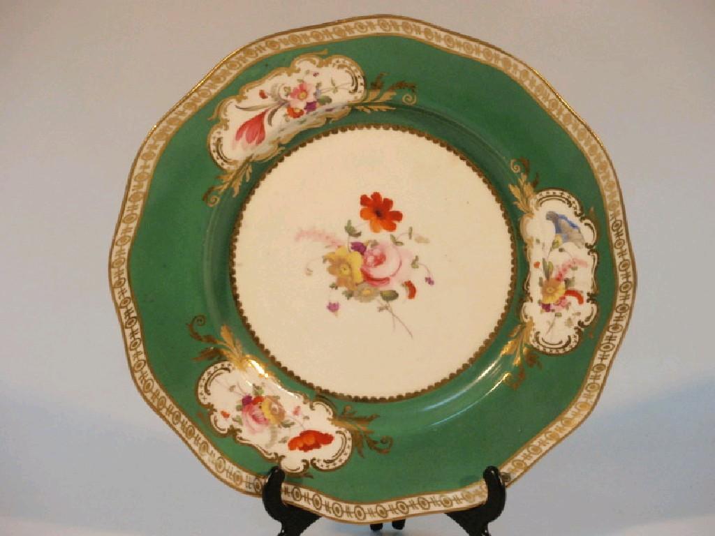 Appraisal: A thC English porcelain plate with Rockingham style hand painted