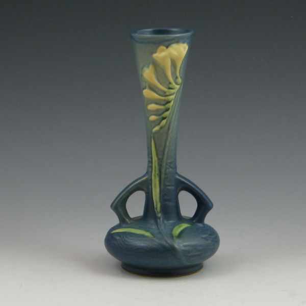 Appraisal: Roseville Freesia bud vase in blue Marked Roseville USA -