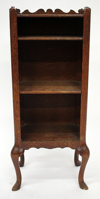 Appraisal: A SMALL FRENCH OAK BEDSIDE CABINET with shaped galleried top