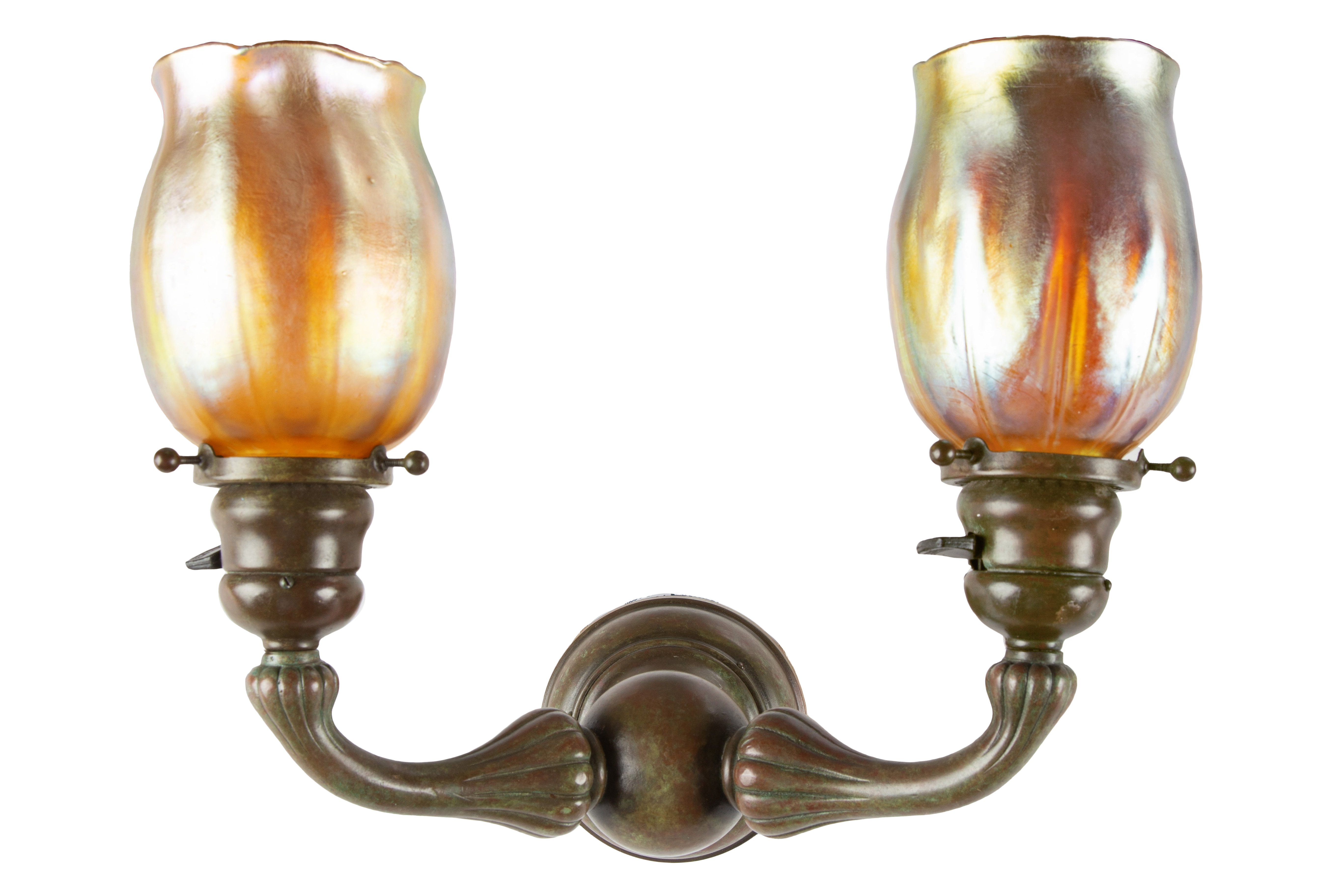 Appraisal: TIFFANY STUDIOS NEW YORK LIGHT SCONCE patinaed bronze and favrile