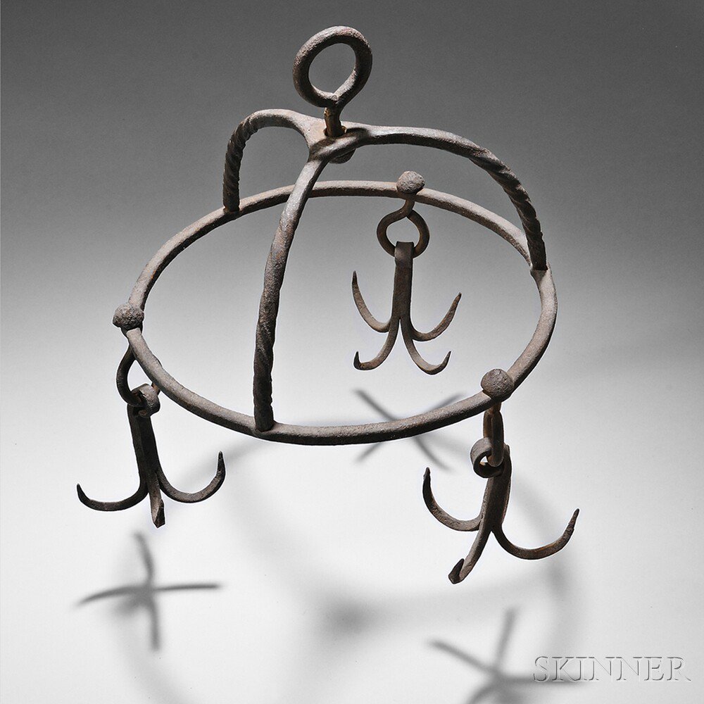 Appraisal: Three Wrought Iron Hanging Racks America late th early th