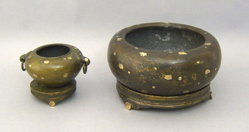 Appraisal: Two Chinese bronze bowls with stands together with two carved