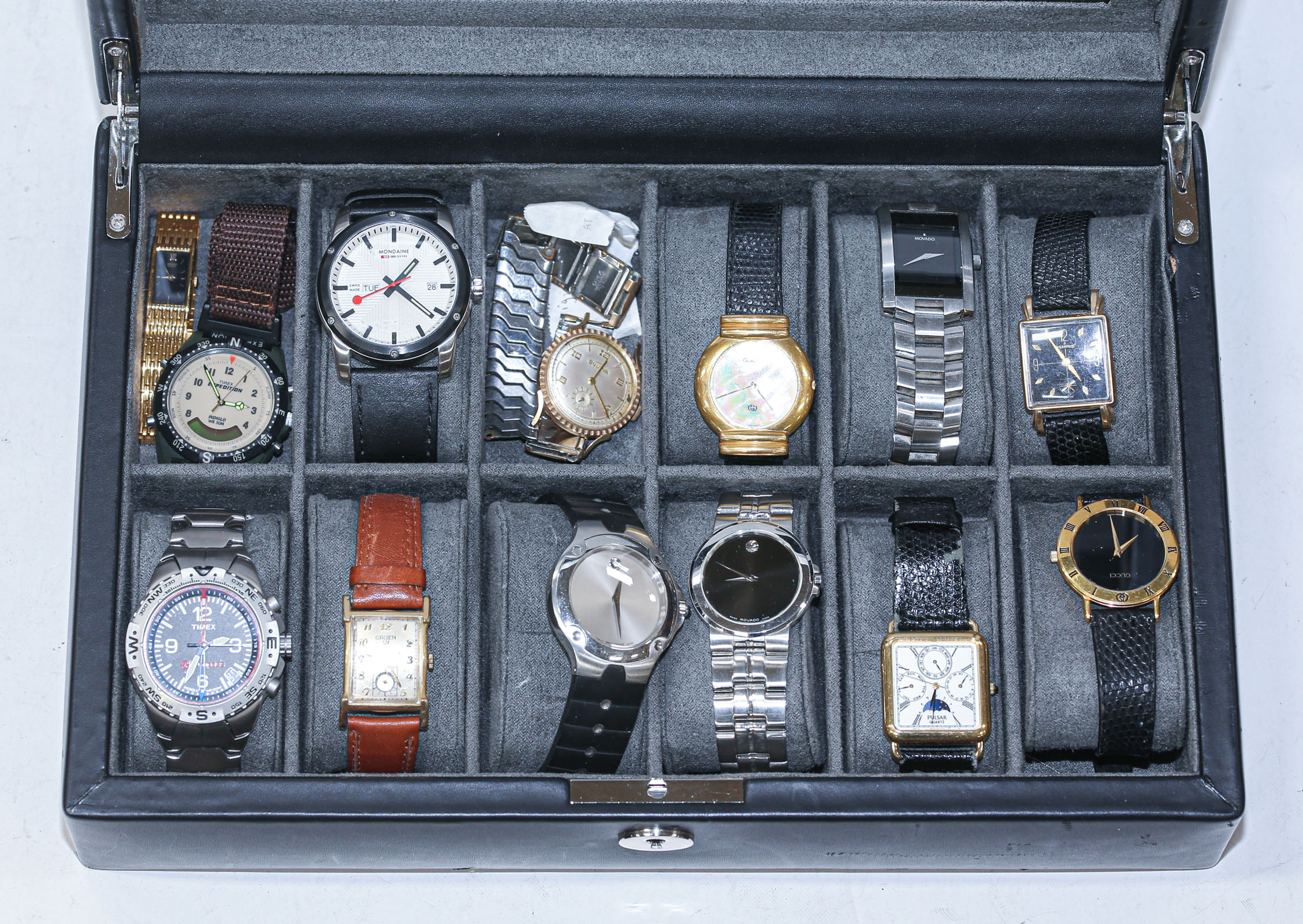 Appraisal: A COLLECTION OF MEN'S VINTAGE MODERN WATCHES Leather presentation case