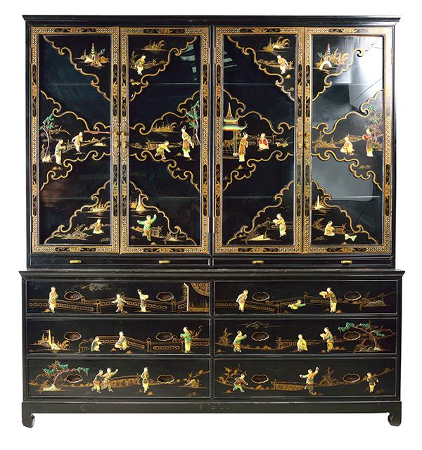 Appraisal: A DOUBLE BODIED ORIENTAL CABINET Ornately carved motifs bone inlay