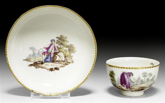 Appraisal: CUP AND SAUCER WITH LANDSCAPE PAINTING AND 'LARGE FIGURE' DECORATION