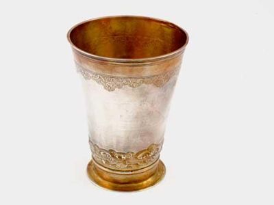 Appraisal: An early th century German parcel gilt beaker on a