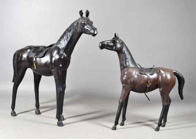 Appraisal: Lifesize Leather Covered HorsesBoth with English saddles includes a larger