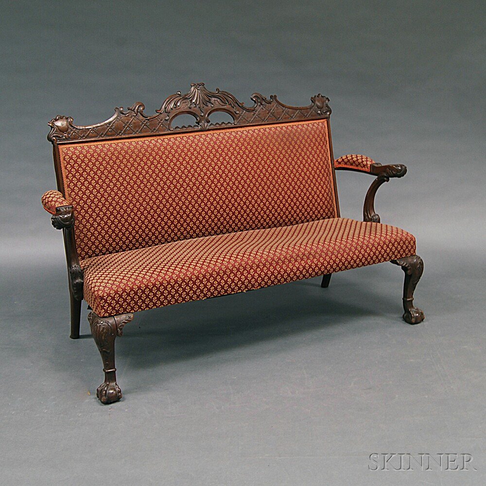 Appraisal: Chippendale-style Carved Mahogany Upholstered Settee the shaped and pierced cresting